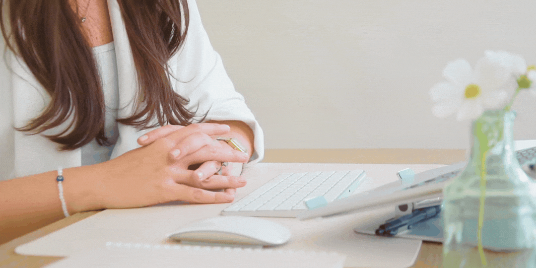 A softly blurred background image depicting a modern, light-filled office or workspace with a computer screen, setting a professional tone for the business resources page.
