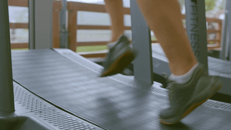 Gif of a person's feet running on a treadmill