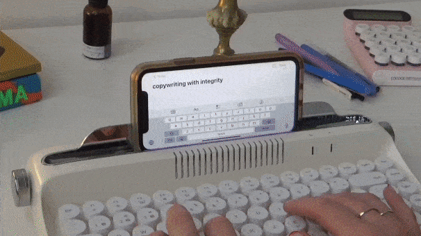 A gif displaying various BTS shots of the word witch, including a shot of Margarit tpying ont he couch, writing in the notebook, brainsotmring with a smile, tarot cards, throwing her head back on a spiral staircase, etc.