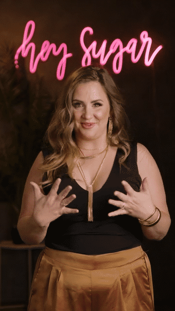 On-camera talent showcasing brand personality during professional video production shoot
