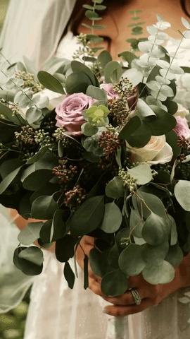 gif of a wedding bouquet with green lambs ear and pink flowers
