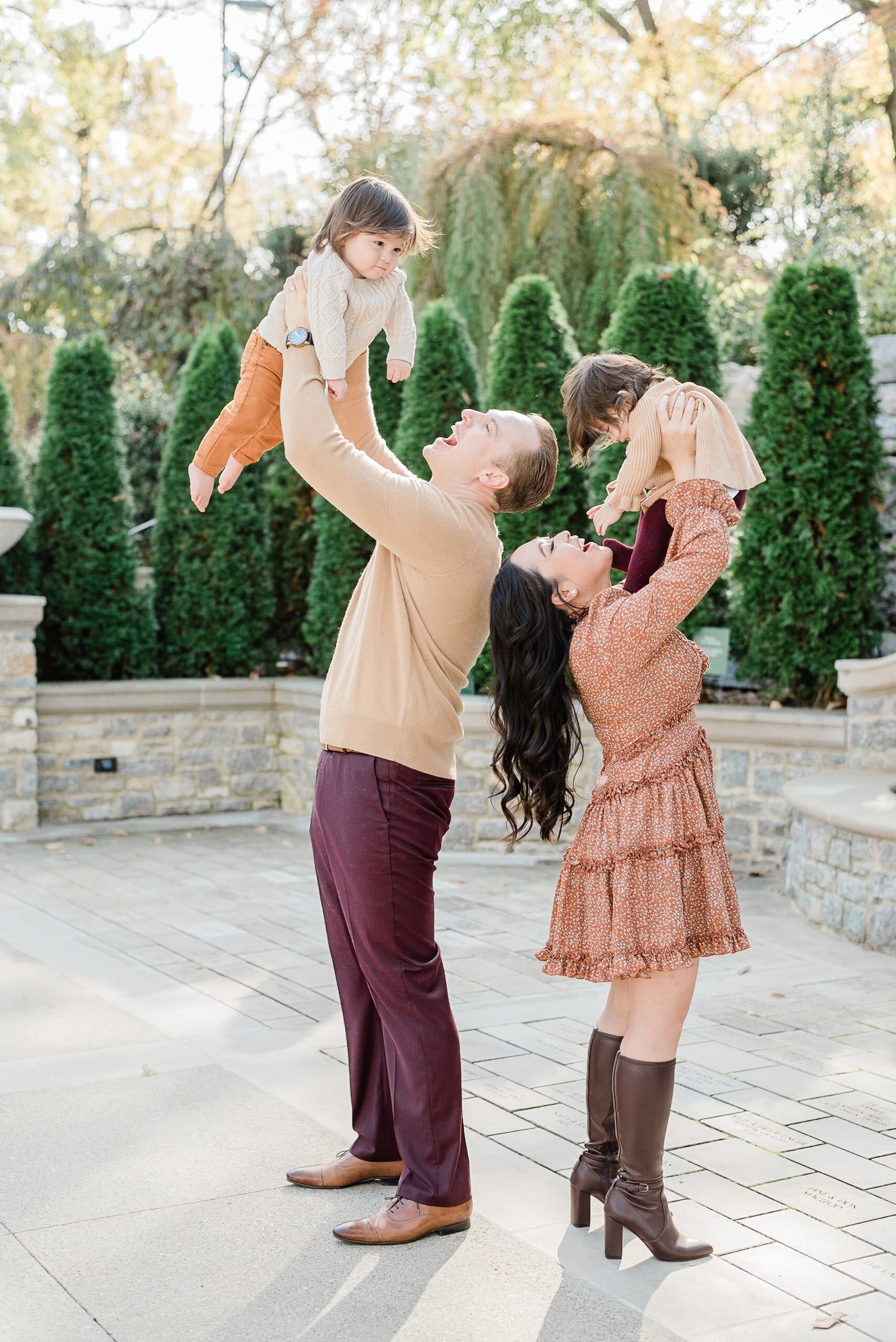 Family of four photos at Nashville Luxury Cheekwood Gardens by Nashville Family Photographer Dolly DeLong Photography A Fall family session at Cheekwood