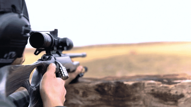Gun accessories shop promotional video showing shooter using upgraded firearm gear outdoors