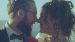 Vintage Super 8mm film of a bride and groom's intimate moments, offering an artistic and nostalgic wedding video style.