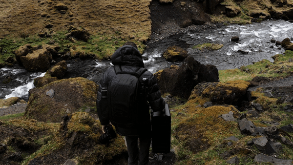 behind the scenes of an elopement in iceland carrying video gear