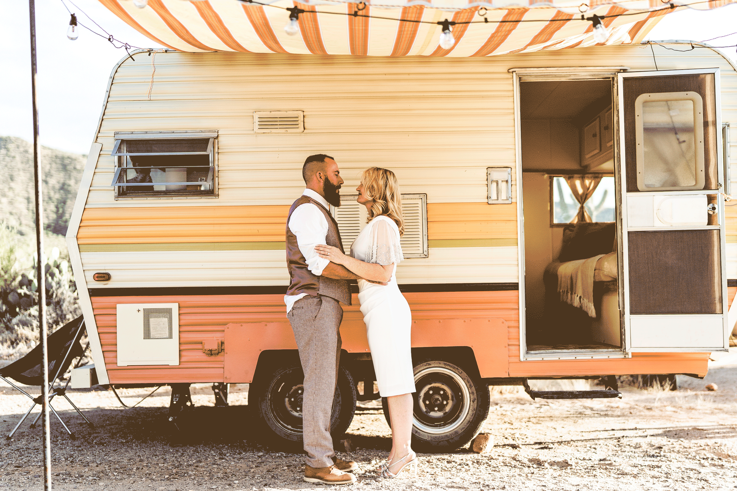 Saguaro National Park elopement couple with vintage travel trailer in Tucson, Arizona.