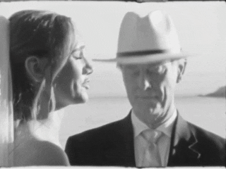 Intimate candlelit wedding details documented through video on authentic vintage Super 8mm film. 
