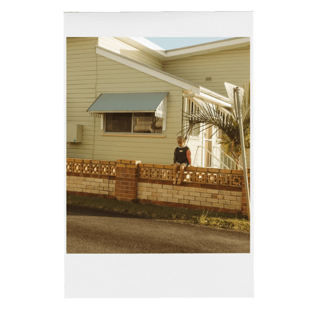 A series of images captured by Demi Fraser turned into a GIF file of a little boy jumping over a brick wall of an old beach house in Evans Head NSW.