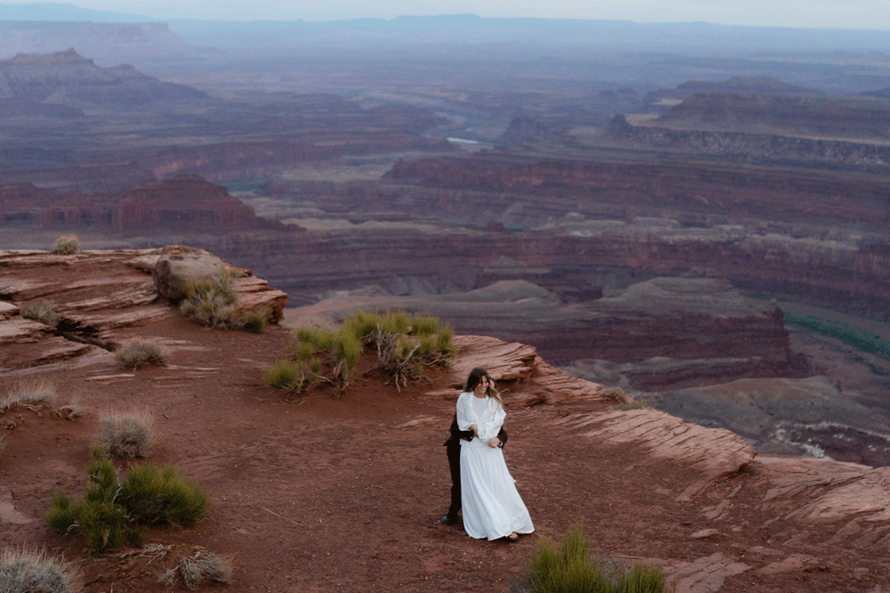 couple at a ranch in the mountains