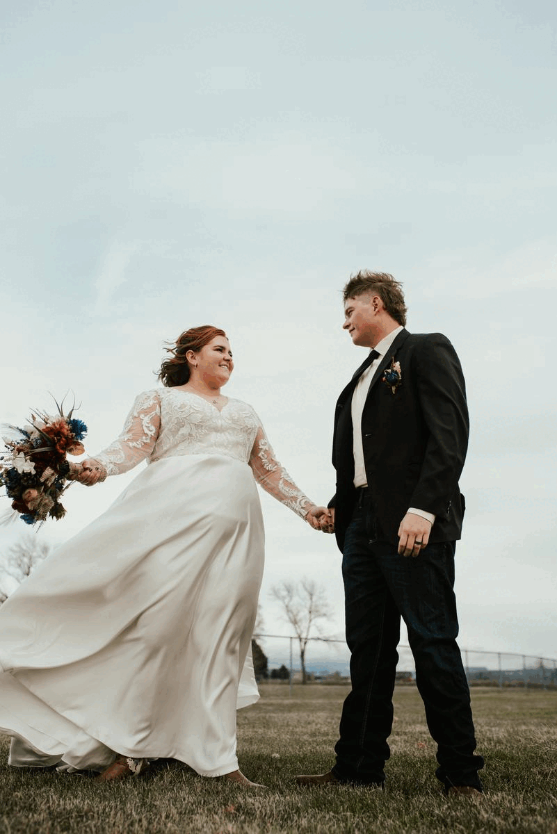 happy couple dancing after their Utah wedding