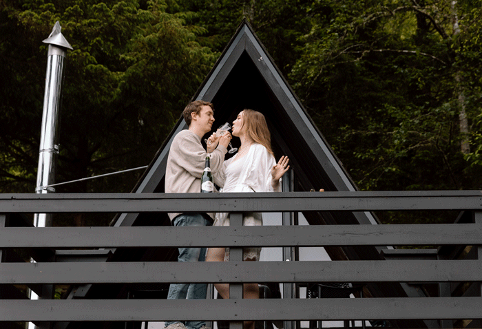 Bride and groom toasting with champagne.